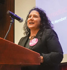 Woman speaking at the September Public Meeting.